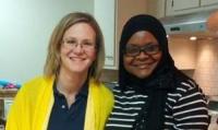 Audrey Sawyer, a white blonde woman with glasses, and Zaina Hussein, a Black woman with a headscarf and glasses